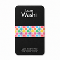 A black rectangular card or packaging piece with rounded corners, featuring the text 'Luxe Washi' at the top and 'Luxe Washi Mini' at the bottom, with a colorful patterned strip across the middle. The brand 'The Jadore Studio' is printed at the bottom.